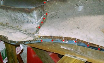 Locations of spotwelds on the rear half of the wheel house that hold it to the rear quarter panel