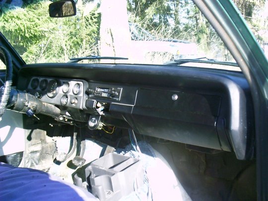The dash after repainting during the windshield rust repairs